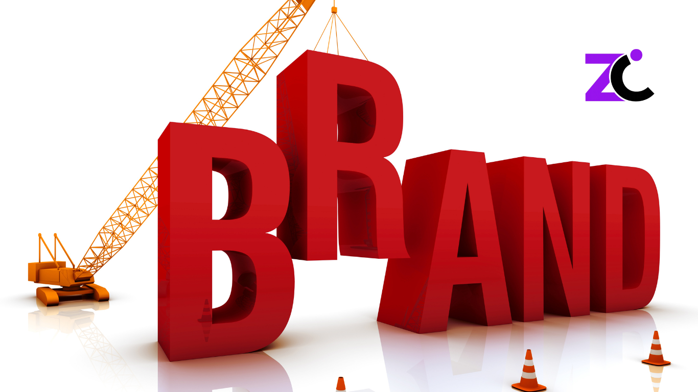 A crane lifts the word “Brand” into place, with traffic cones surrounding the area to symbolize branding in progress—representing brand strategy services in the UAE.