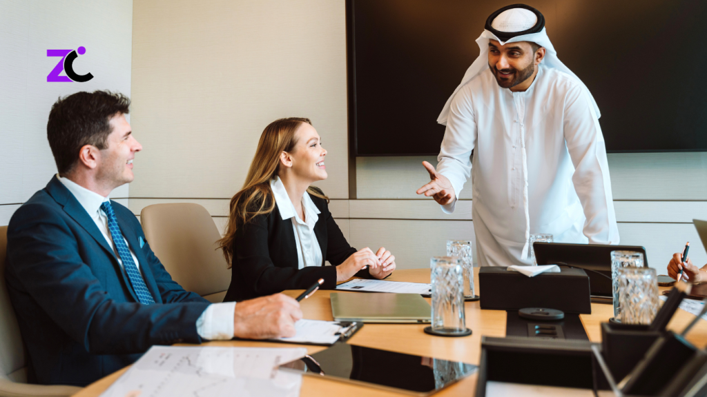 Arab businessman conducting an OKR Consultant Dubai training session for employees, explaining strategic goals and performance management.