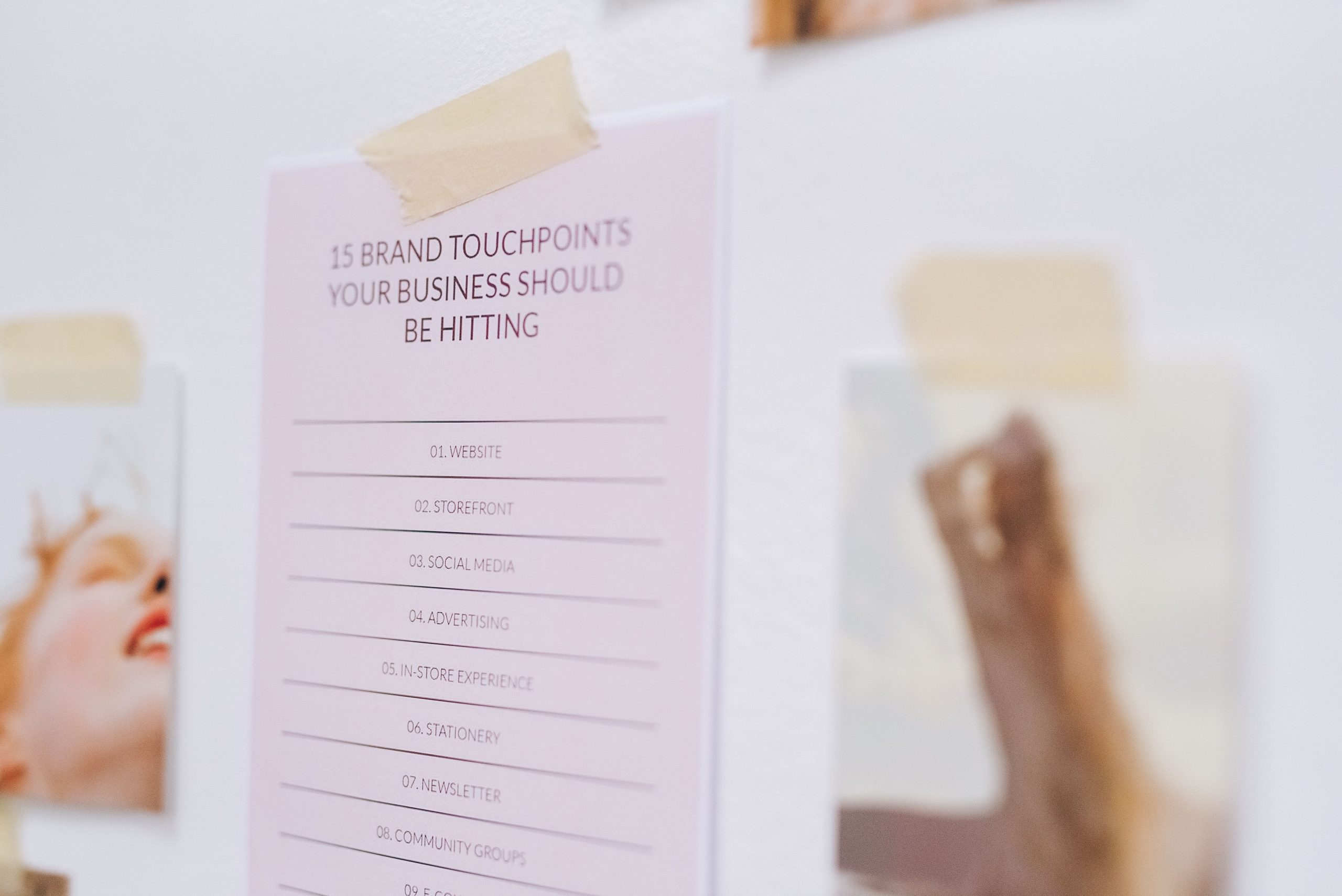 Brand Strategy and Consulting Services to-do list displayed on a wall with key branding tasks and planning notes.