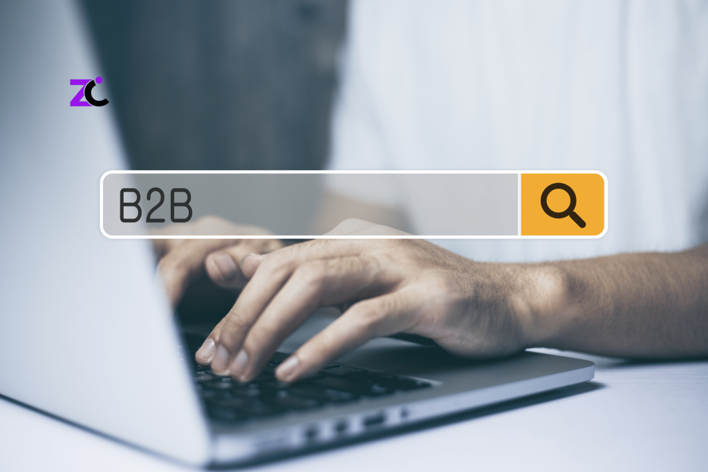 B2B eCommerce Website Development in UAE concept showing a man typing on a laptop with B2B keywords displayed in the search bar.