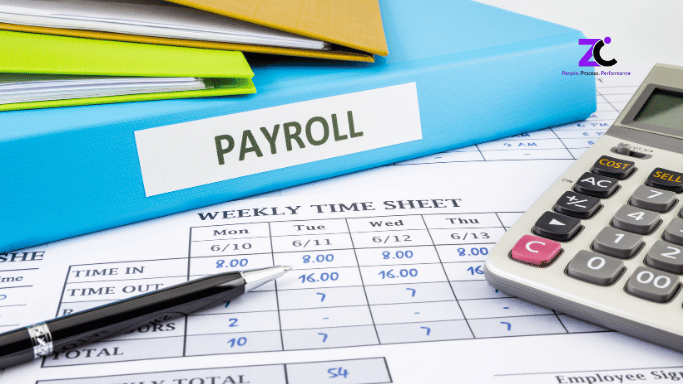 Payroll outsourcing cost uae. Image showing file holder holding invoices and weekly time sheet calculation.